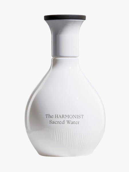 The Harmonist Sacred Water Parfum in branded component on a light gray background